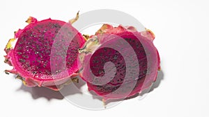 Dragon fruit slices with blushed red flesh