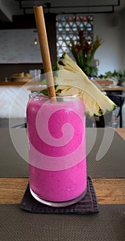 Dragon Fruit Smoothie with Pineapple and Wood Straw