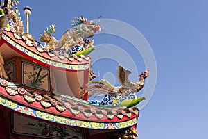 Dragon and phoenix on the templ roof photo