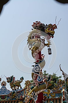 Dragon pole in Wat Phananchoeng the important historical temple and there are outstanding architectures