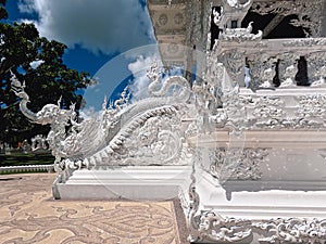 Dragon railings and other ornamentation of White Temple at Chiang Rai