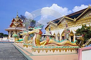 Dragon sculpture near the Buddhist temple photo