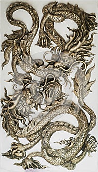 Dragon sculpture on wall