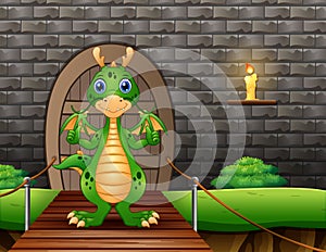 A dragon showing thumb up and standing on suspension bridge