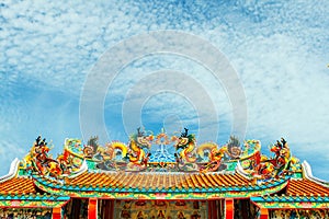 Dragon statue, decorated on the roof of a Buddhist temple in Thailand