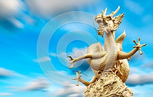 Dragon statue and natural long exporture blue sky.