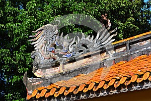 Dragon statue on the Palace cornice in Tu Cam Thanh palace in Hue,Vietnam