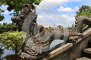 Dragon statue in Water Palace of Tirta Gangga East Bali, Indones
