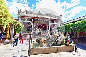 Dragon Statues and Main Assembly Hall of Quang Dong Temple