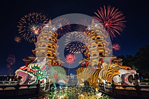 The Dragon and Tiger Pagodas (Lotus Lake, Kaohsiung, Taiwan) with fireworks