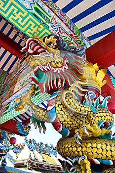 Dragon wrapped around the pole in the shrine