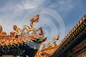 The dragons decorations on the roof of Da Zhao or Wuliang temple, China