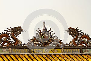 Dragons on roof of Citadel of Hue Vietnam