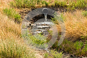 Drain sewer pipes in the open space of nature