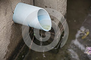 Drain water in PVC pipe.