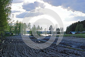 Drainage ditch in the peat extraction site. Drainage and destruction of peat bogs in finland