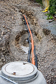 Drainage ditch with sewer pipe
