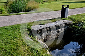 Drainage drainage reclamation channel is an outdated way to lower groundwater levels. dikes of gray stones. supplies water to irri