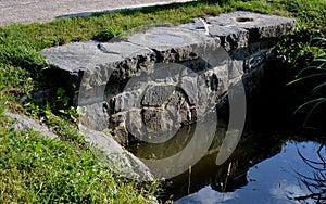 Drainage drainage reclamation channel is an outdated way to lower groundwater levels. dikes of gray stones. supplies water to irri