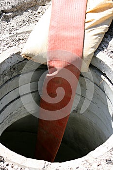 Drainage hose and hole