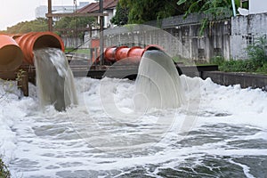 Drainage pipe with water flowing into the river