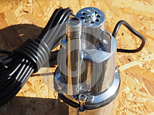 Drainage pump with metal body. Water pumping for garden watering