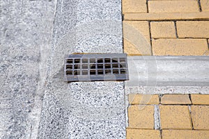 Drainage system grate, grill for removal of stormwater.
