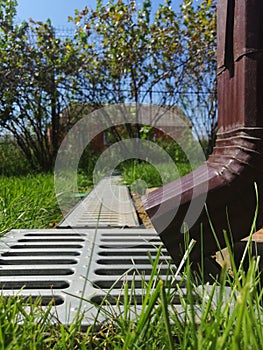 Drainage systems. idea - building a house, storm taps. metal construction from the roof - sewer and grate on the ground for