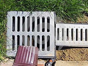 Drainage systems. idea - building a house, storm taps. metal construction from the roof - sewer and grate on the ground for