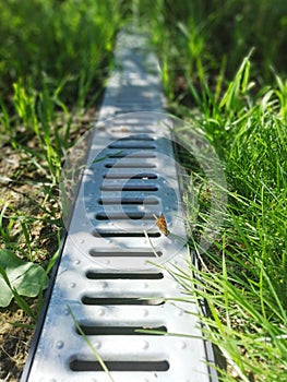 Drainage systems. idea - building a house, storm taps. metal construction from the roof - sewer and grate on the ground for