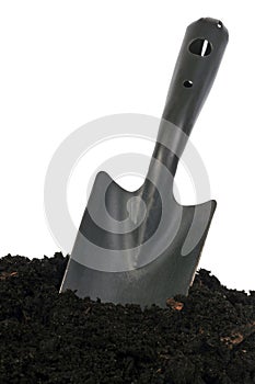 Drainer in potting soil on a white background