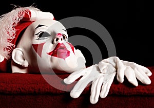 Drama white-red mask of actor and pair gloves