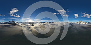 Dramatic Aerial Panorama of Clouds and Mountain Landscape. Nature Background.