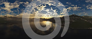 Dramatic Aerial Panorama of Clouds and Mountain Landscape. Nature Background.