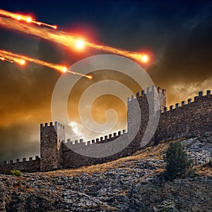 Old fortress, tower under attack photo