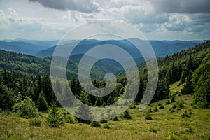 Dramatic beautiful Carpathian Mountains nature landscape photography from above with horizon view of sun light rays