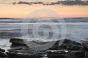 Beautiful dramatic Sunset over a rocky coast