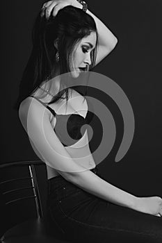 Dramatic black and white portrait of a beautiful slim girl