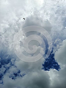 Dramatic blue sky background, thundery sky landscape scene. Colorful cloudy sky view in bright tones.