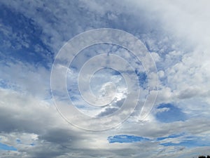 Dramatic blue sky with some grey clouds. Concept of immensity photo