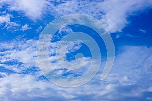 Dramatic blue sky with white clouds