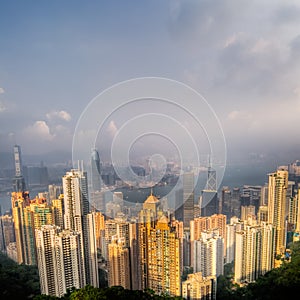 Dramatic cityscape with skyscraper and blue sky