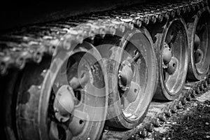 Dramatic closeup of tank tracks. War horror concept