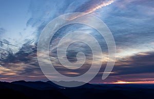 Dramatic clouds fill the sky over Blue Ridge Mountains in spring.CR3