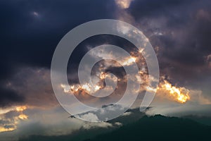 Dramatic clouds over Hiamalayan mountains after sun set, shot at Okhrey, Sikkim, India. Spectacular cloud formations making a