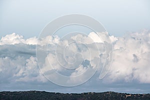 Dramatic clouds over sand dunes