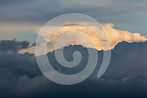 Dramatic clouds at sunset. Cloud illuminated by the sun