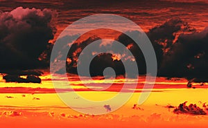 dramatic cloudy sky at fiery sunset