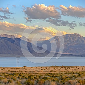 Dramatic cloudy sky over Utah Lake and mountains