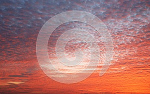 Dramatic colorful orange color sky with clouds in the evening